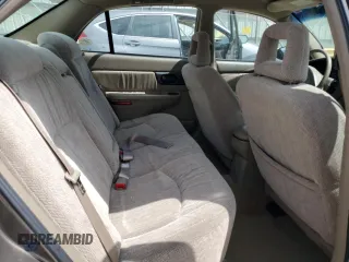 2003 Buick Regal LS z VIN 2G4WB52K731166956, wystawiony jako Copart lot #54233005 z przebiegiem 192 207 mil mil oraz Nie do naprawy • Non repairable. Historia ofert i sprzedaży dostępna na DreamBid. Obrazek 10.