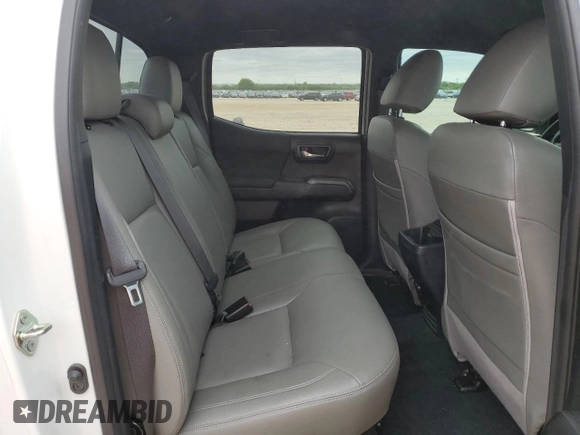 2018 Toyota Tacoma SR5 z VIN 5TFAZ5CNXJX065932, wystawiony jako Copart lot #52046845 z przebiegiem 61 980 mil mil oraz Szkoda całkowita • Salvage title. Historia ofert i sprzedaży dostępna na DreamBid. Obrazek 10.