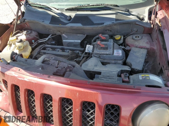 2014 Jeep Patriot Sport z VIN 1C4NJPBB2ED881049, wystawiony jako Copart lot #57363385 z przebiegiem 169 405 mil mil oraz Szkoda całkowita • Salvage title. Historia ofert i sprzedaży dostępna na DreamBid. Obrazek 11.