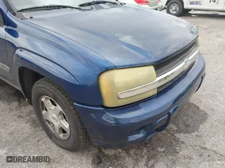 2003 Chevrolet TrailBlazer LS with VIN 1GNDS13S732260569, listed as a IAAI auction lot 41818640 with 243,938 mi miles. Bid and sale history available at carsss.com. Image 6.