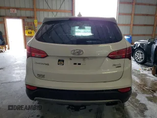 2016 Hyundai Santa Fe z VIN 5XYZTDLB8GG353853, wystawiony jako Copart lot #51740105 z przebiegiem 147 007 mil mil oraz Szkoda całkowita • Salvage title. Historia ofert i sprzedaży dostępna na DreamBid. Obrazek 6.