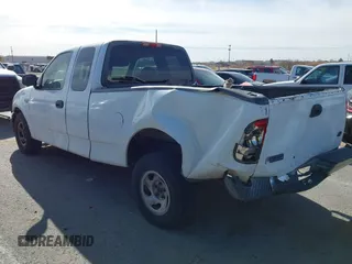 2003 Ford F-150 XL with VIN 1FTRX17213NA81064, listed as a IAAI auction lot 41796923 with 339,333 mi miles. Bid and sale history available at carsss.com. Image 3.