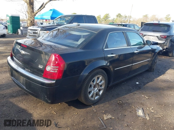 2009 Chrysler 300 Limited with VIN 2C3KA33V59H570460, listed as a IAAI auction lot 42017573 with 130,600 mi miles. Bid and sale history available at carsss.com. Image 4.