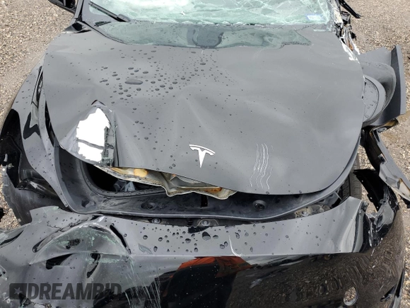2024 Tesla Model Y z VIN 7SAYGDED7RF018059, wystawiony jako Copart lot #54273785 z przebiegiem 30 080 mil mil oraz Szkoda całkowita • Salvage title. Historia ofert i sprzedaży dostępna na DreamBid. Obrazek 11.