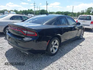 2015 Dodge Charger SXT with VIN 2C3CDXHG2FH852208, listed as a IAAI auction lot 42120021 with 156,486 mi miles and . Bid and sale history available at DreamBid. Image 4.