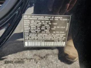 2021 Volkswagen Atlas SEL with VIN 1V2ER2CA5MC542810, listed as a Copart auction lot 57243245 with 104,505 mi miles and Salvage title. Bid and sale history available at DreamBid. Image 12.