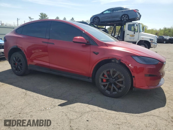 2023 Tesla Model X Plaid with VIN 7SAXCBE66PF427020, listed as a Copart auction lot 53890405 with 30,575 mi miles and Salvage Title. Bid and sale history available at DreamBid. Image 4.