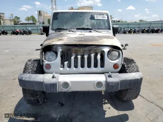 2011 Jeep Wrangler Unlimited Sahara with VIN 1J4BA5H14BL613895, listed as a Copart auction lot 65171404 with 0 mi miles and Non Repairable. Bid and sale history available at carsss.com. Image 5.