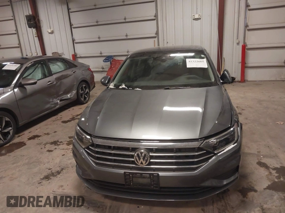 2021 Volkswagen Jetta SEL with VIN 3VWE57BU9MM086571, listed as a IAAI auction lot 41322665 with 33,584 mi miles and . Bid and sale history available at DreamBid. Image 6.