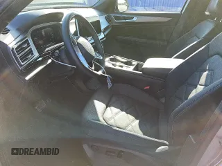 2024 Volkswagen Atlas SE z VIN 1V2HE2CA3RC219047, wystawiony jako Copart lot #56604585 z przebiegiem 32 453 mil mil oraz Czysty tytuł • Clean title. Historia ofert i sprzedaży dostępna na DreamBid. Obrazek 7.