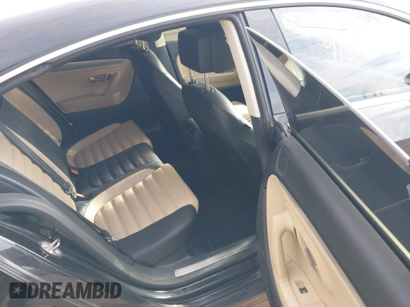 2014 Volkswagen CC Sport with VIN WVWBP7AN4EE534247, listed as a IAAI auction lot 41542076 with 119,199 mi miles and . Bid and sale history available at DreamBid. Image 8.