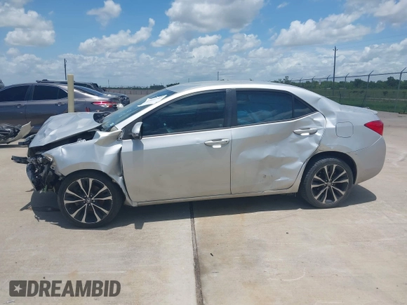 2017 Toyota Corolla L z VIN 5YFBURHE4HP732912, wystawiony jako IAAI lot #42451597 z przebiegiem 73 901 mil mil oraz . Historia ofert i sprzedaży dostępna na DreamBid. Obrazek 14.