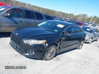 2016 Ford Fusion Titanium with VIN 3FA6P0K90GR179528, listed as a IAAI auction lot 41587248 with 230,264 mi miles and . Bid and sale history available at DreamBid. Image 2.