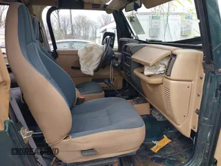 1999 Jeep Wrangler Sahara with VIN 1J4FY49S7XP440582, listed as a IAAI auction lot 41967151 with 163,710 mi miles and . Bid and sale history available at carsss.com. Image 5.