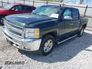2013 Chevrolet Silverado 1500 LT with VIN 3GCPKSE77DG256115, listed as a IAAI auction lot 41984990 with 270,324 mi miles. Bid and sale history available at carsss.com. Image 2.