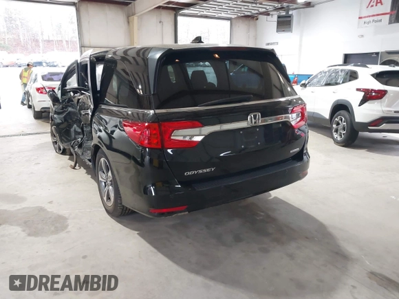 2018 Honda Odyssey Touring with VIN 5FNRL6H87JB105410, listed as a IAAI auction lot 41860707 with 91,908 mi miles. Bid and sale history available at carsss.com. Image 3.