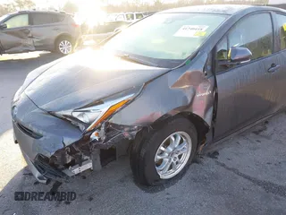 2017 Toyota Prius Two z VIN JTDKARFU4H3042976, wystawiony jako IAAI lot #41740418 z przebiegiem 66 734 mil mil oraz . Historia ofert i sprzedaży dostępna na DreamBid. Obrazek 6.