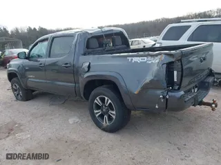 2019 Toyota Tacoma 4WD SR with VIN 3TMCZ5AN6KM199663, listed as a IAAI auction lot 41429013 with 73,574 mi miles. Bid and sale history available at carsss.com. Image 3.
