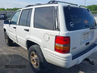 1998 Jeep Grand Cherokee Limited z VIN 1J4GZ78Y9WC342250, wystawiony jako IAAI lot #42047991 z przebiegiem 271 579 mil mil oraz . Historia ofert i sprzedaży dostępna na DreamBid. Obrazek 3.