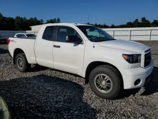 2010 Toyota Tundra 4WD Truck with VIN 5TFUY5F10AX128464, listed as a Copart auction lot 70081574 with 229,736 mi miles and Clean Title. Bid and sale history available at carsss.com. Image 4.