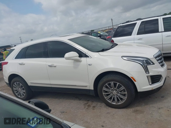 2019 Cadillac XT5 Luxury FWD z VIN 1GYKNCRSXKZ286643, wystawiony jako IAAI lot #42129213 z przebiegiem 87 091 mil mil oraz . Historia ofert i sprzedaży dostępna na DreamBid. Obrazek 13.