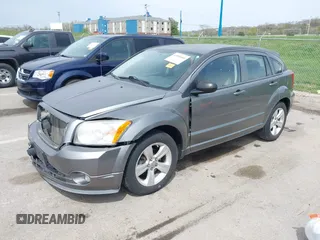 2012 Dodge Caliber SXT with VIN 1C3CDWDA6CD506019, listed as a IAAI auction lot 41999560 with 146,446 mi miles and . Bid and sale history available at DreamBid. Image 2.