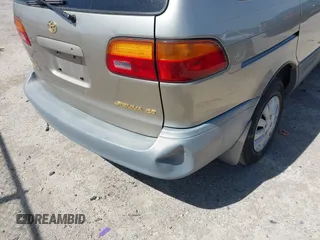 2000 Toyota Sienna CE with VIN 4T3ZF19C6YU263755, listed as a IAAI auction lot 41858870 with 190,171 mi miles. Bid and sale history available at carsss.com. Image 12.