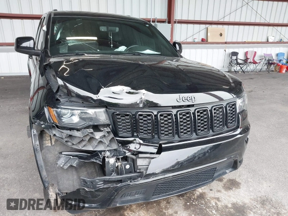 2019 Jeep Grand Cherokee Laredo E with VIN 1C4RJFAG0KC565739, listed as a IAAI auction lot 42039038 with 103,358 mi miles and . Bid and sale history available at DreamBid. Image 6.