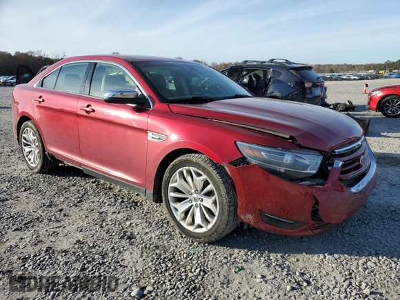 2014 Ford Taurus Limited with VIN 1FAHP2F81EG183128, listed as a Copart auction lot 82409384 with 107,624 mi miles and Salvage title. Bid and sale history available at DreamBid. Image 4.