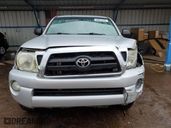 2007 Toyota Tacoma z VIN 5TEMU52NX7Z338432, wystawiony jako Copart lot #55851235 z przebiegiem 194 976 mil mil oraz Szkoda całkowita • Salvage title. Historia ofert i sprzedaży dostępna na DreamBid. Obrazek 5.