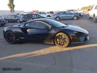 2023 McLaren Artura with VIN SBM16AEA4PW001449, listed as a IAAI auction lot 41347791 with 4,703 mi miles. Bid and sale history available at carsss.com. Image 13.