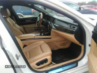 2015 BMW 7 Series 750Li with VIN WBAYE8C50FD781160, listed as a IAAI auction lot 41061232 with 154,496 mi miles. Bid and sale history available at carsss.com. Image 5.