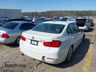 2014 BMW 3 Series 320i with VIN WBA3B1C50EK132169, listed as a IAAI auction lot 41570678 with 28,871 mi miles. Bid and sale history available at carsss.com. Image 4.
