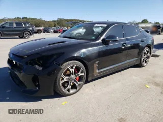 2021 Kia Stinger GT with VIN KNAE35LCXM6092069, listed as a Copart auction lot 75066644 with 79,899 mi miles and Salvage Title. Bid and sale history available at carsss.com. Image 1.
