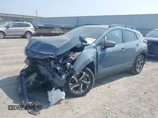2024 Subaru Crosstrek Premium with VIN JF2GUADC9RH202736, listed as a IAAI auction lot 42735432 with 7,100 mi miles and . Bid and sale history available at DreamBid. Image 2.