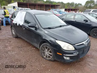 2009 Hyundai Elantra Touring z VIN KMHDC86E99U039276, wystawiony jako IAAI lot #41866670 z przebiegiem 143 448 mil mil oraz . Historia ofert i sprzedaży dostępna na DreamBid. Obrazek 1.