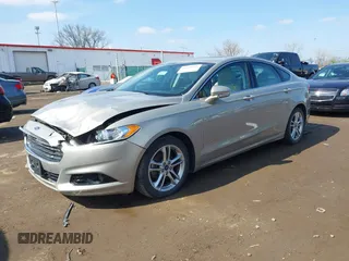2016 Ford Fusion Titanium Hybrid with VIN 3FA6P0RU5GR171287, listed as a IAAI auction lot 41918195 with 74,721 mi miles. Bid and sale history available at carsss.com. Image 17.