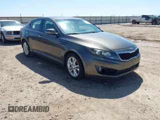 2013 Kia Optima LX with VIN 5XXGM4A74DG093454, listed as a IAAI auction lot 42004990 with 176,667 mi miles. Bid and sale history available at carsss.com. Image 1.