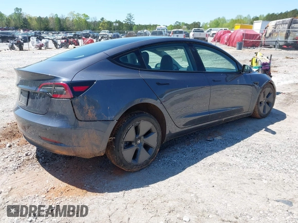2023 Tesla Model 3 z VIN 5YJ3E1EA0PF655244, wystawiony jako IAAI lot #42004592 z przebiegiem 54 860 mil mil oraz . Historia ofert i sprzedaży dostępna na DreamBid. Obrazek 4.