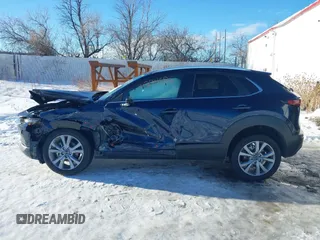 2022 Mazda CX-30 S Select with VIN 3MVDMBBL9NM448264, listed as a IAAI auction lot 41294686 with 9,324 mi miles and . Bid and sale history available at DreamBid. Image 14.
