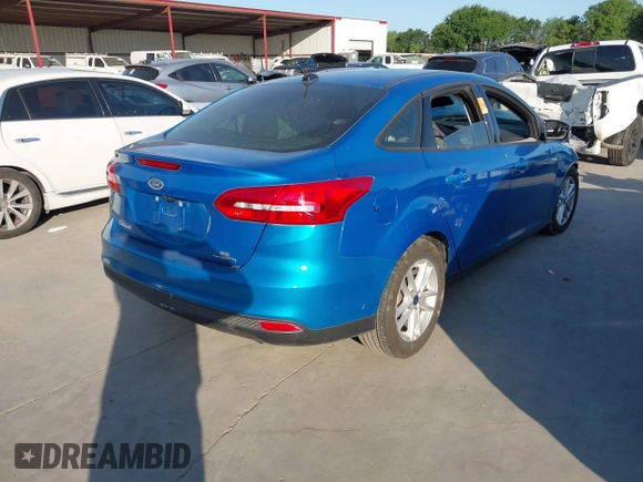 2016 Ford Focus SE with VIN 1FADP3F2XGL387131, listed as a IAAI auction lot 41992802 with 112,274 mi miles and . Bid and sale history available at DreamBid. Image 4.