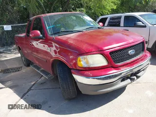 2002 Ford F-150 XL with VIN 1FTRX17W02KB40270, listed as a IAAI auction lot 42573017 with Not provided miles and . Bid and sale history available at DreamBid. Image 1.