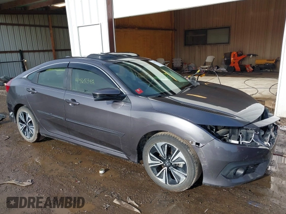 2018 Honda Civic EX-L z VIN JHMFC1F85JX014701, wystawiony jako IAAI lot #41467342 z przebiegiem 50 292 mil mil oraz . Historia ofert i sprzedaży dostępna na DreamBid. Obrazek 14.