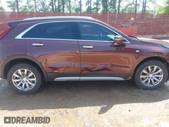 2023 Cadillac XT4 AWD Premium Luxury with VIN 1GYFZDR46PF125499, listed as a IAAI auction lot 41919403 with 44,647 mi miles and . Bid and sale history available at carsss.com. Image 17.