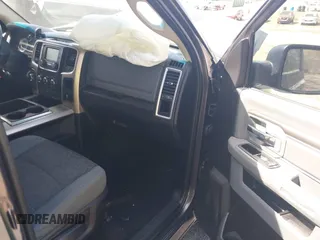 2015 Ram 1500 Big Horn z VIN 1C6RR7GT8FS549293, wystawiony jako IAAI lot #41833000 z przebiegiem Nie podano mil oraz . Historia ofert i sprzedaży dostępna na DreamBid. Obrazek 5.