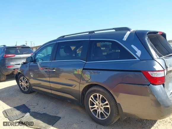 2012 Honda Odyssey EX-L with VIN 5FNRL5H64CB066240, listed as a IAAI auction lot 41792321 with 186,895 mi miles. Bid and sale history available at carsss.com. Image 13.