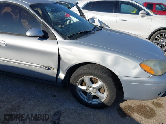 2004 Ford Taurus SE with VIN 1FAFP53U74A125083, listed as a IAAI auction lot 41637777 with 132,100 mi miles and . Bid and sale history available at DreamBid. Image 6.