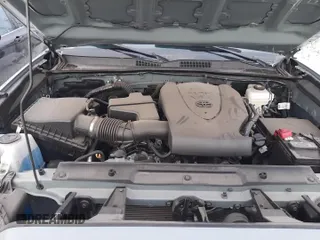 2023 Toyota Tacoma SR z VIN 3TMCZ5AN3PM605597, wystawiony jako Copart lot #88404445 z przebiegiem 69 552 mil mil oraz Czysty tytuł • Clean title. Historia ofert i sprzedaży dostępna na DreamBid. Obrazek 13.