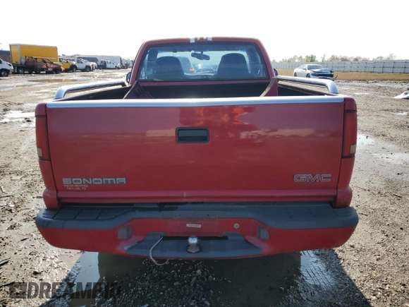1998 GMC Sonoma z VIN 1GTCS144XWK512047, wystawiony jako Copart lot #85928244 z przebiegiem 259 749 mil mil oraz Szkody całkowita. Historia ofert i sprzedaży dostępna na DreamBid. Obrazek 6.