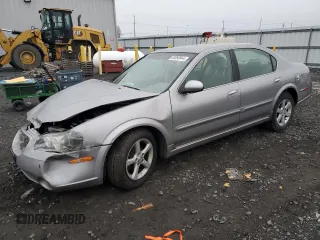 2002 Nissan Maxima GXE z VIN JN1DA31D12T414295, wystawiony jako Copart lot #83090944 z przebiegiem 175 456 mil mil oraz Szkoda całkowita • Salvage title. Historia ofert i sprzedaży dostępna na DreamBid. Obrazek 1.